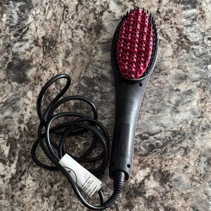 Sleek Black and Pink Hair Straightening Brush